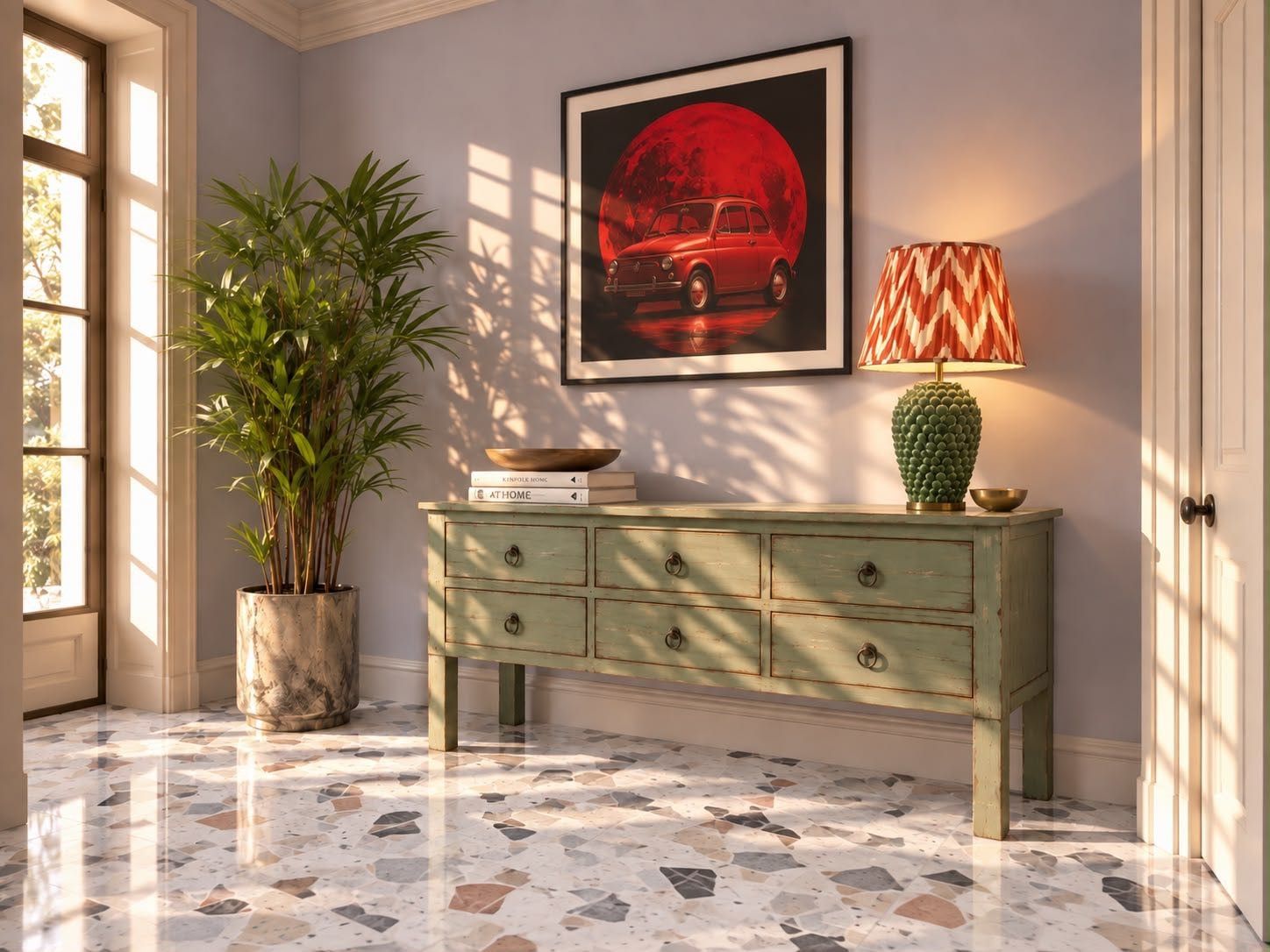 A bright hallway with a console, framed art, and statement lamp